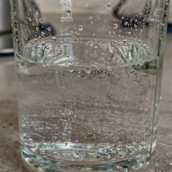 Close-up of a full glass of water with bubbles