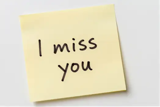 Yellow Sticky Note with 'I Miss You' Cursive Text