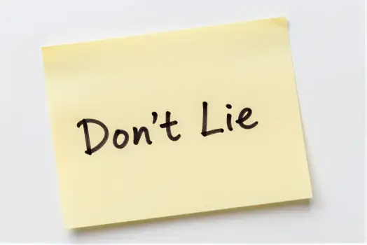 Yellow sticky note with 'Don't Lie' text warning