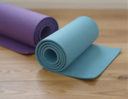 Yoga Mats Rolled Up on Wood Floor wooden floor