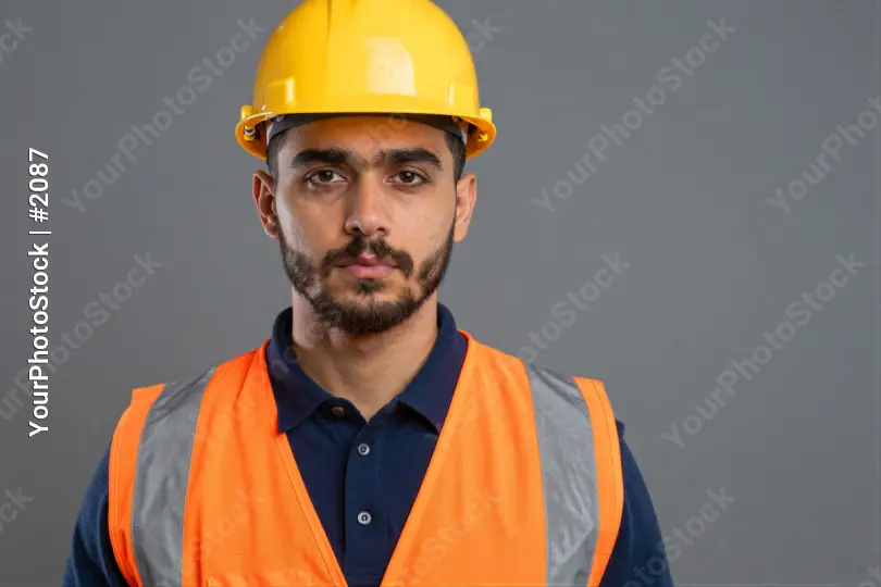 Young man in safety gear looking serious serious expression