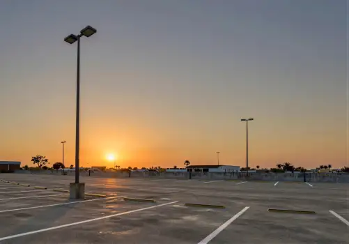 Empty Parking Lot at Sunset street lamps serene