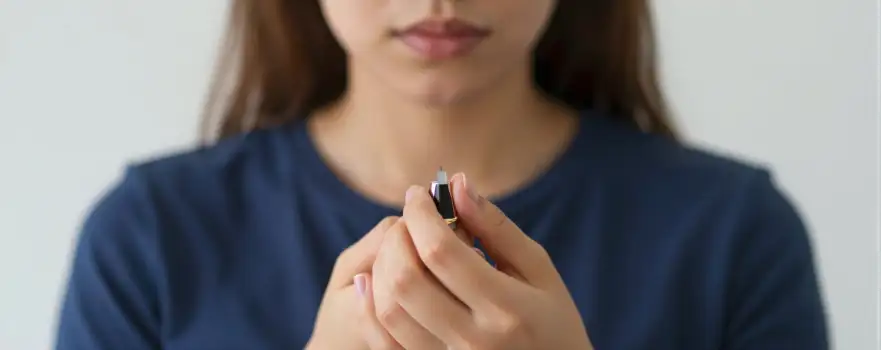 Woman Writing with Pen Close-Up hand blue t-shirt