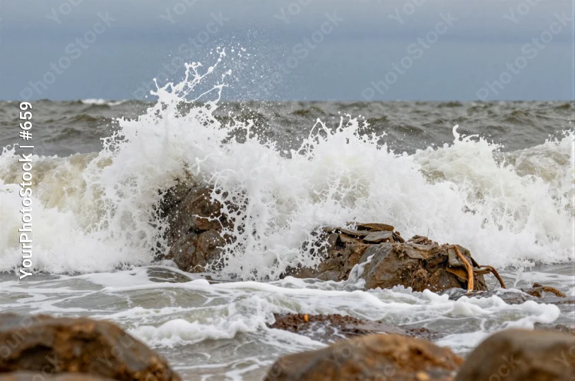 Dramatic Rocky Shoreline with Turbulent Waves