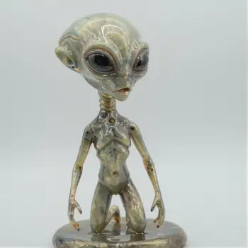 Alien Figurine Standing with Outstretched Arms