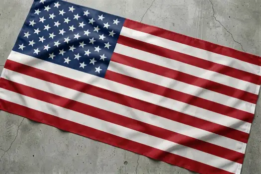 American flag lying on concrete floor stars and stripes