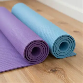 Yoga Mats Rolled Up on Wooden Floor purple light blue