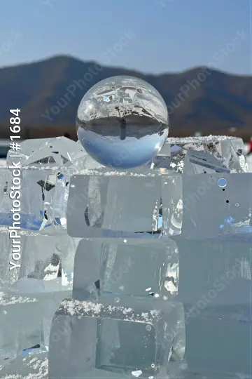 Crystal Ball Floating on Ice Pyramid peaceful