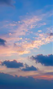 Serene Sunset Sky with Fluffy Clouds peaceful