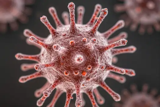 Microscopic View of Spherical Virus with Red Spikes