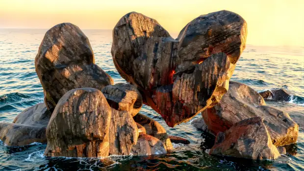Rock Formation by the Ocean with heart shape in the rocks
