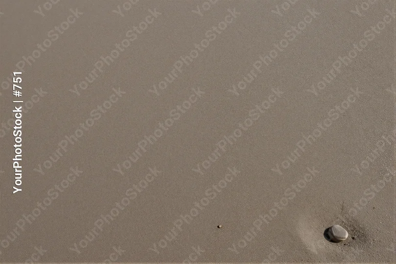 Close-up of Beige Surface with Hole and White Object concrete