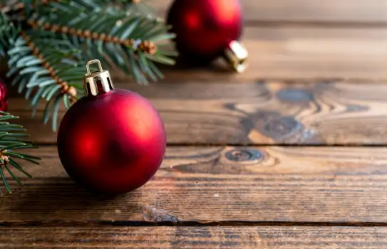 Festive Christmas Decor on Rustic Wooden Surface