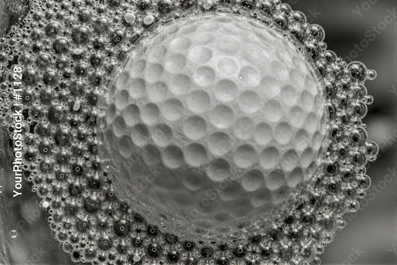 Golf Ball with Bubbles Close-Up black and white