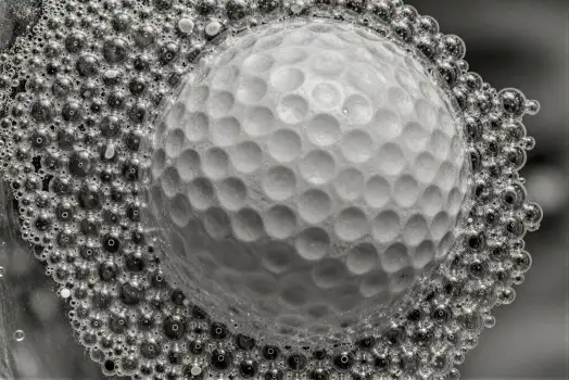 Golf Ball with Bubbles Close-Up black and white