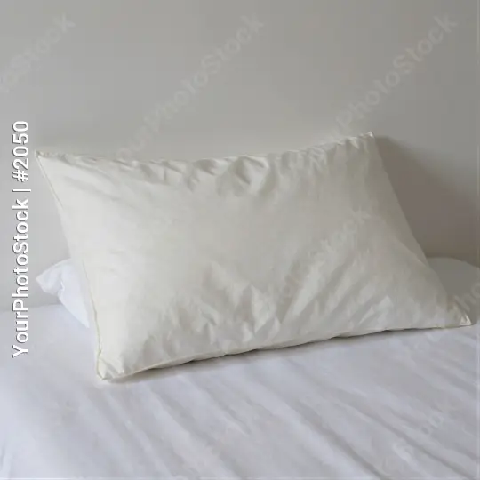 White Square Pillow on Bed soft textured sheet hotel