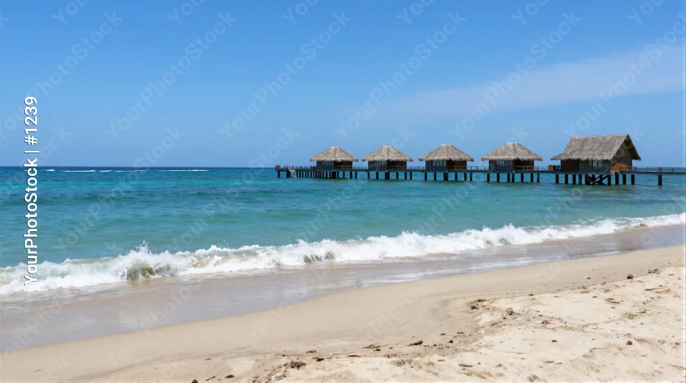 Beach Pier with Thatched Huts Over Water ocean
