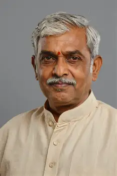 Indian Man in Traditional Outfit with Bindi serious expression