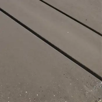 Close-up of Light-Colored Concrete Floor with Diagonal Lines