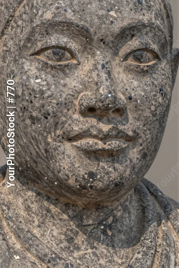 Weathered Stone Statue of Serene Woman peaceful