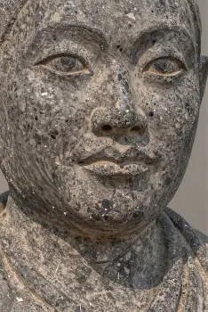 Weathered Stone Statue of Serene Woman peaceful