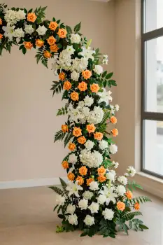 Floral Arrangement in Room with Window white roses