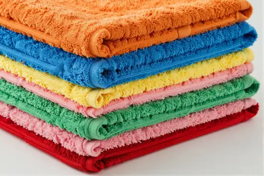 Neatly Folded Towels in Bright Colors soft fluffy