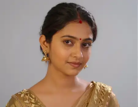 Young Indian Woman in Traditional Saree Smiling