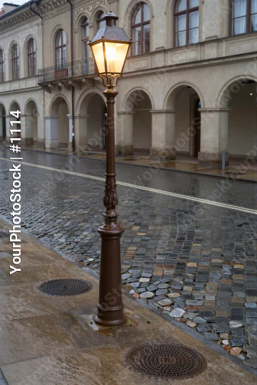 Old Street Lamp on Cobblestone Pavement old-fashioned