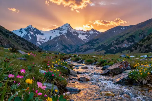Mountain Range at Sunset with Snow-Capped Peaks