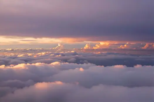 Vast Sky with Fluffy Clouds at Sunset aerial view