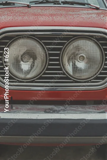 Red Car Grille with Worn Headlights chrome street