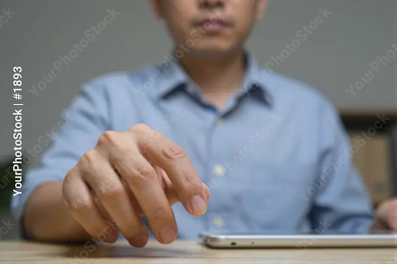 Businessman Working Intently at Desk laptop focused