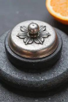 Metallic Flower Object with Orange Slice silver