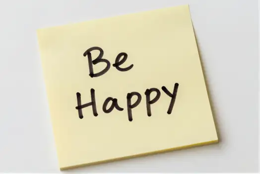 Happy Note on White Background sticky yellow cursive