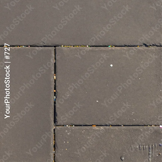 Gray tiled floor with grid pattern and cleaning marks