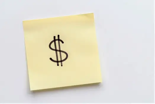 Sticky Note with Dollar Sign for Budgeting finance