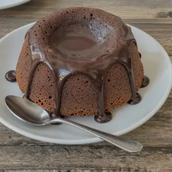 Chocolate Bundt Cake on Plate ganache drizzle