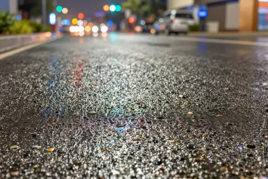 Wet Road at Night in City city street particles