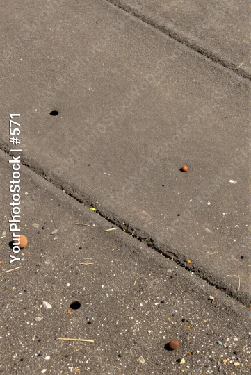 Weathered Concrete Pavement with Cracks and Holes