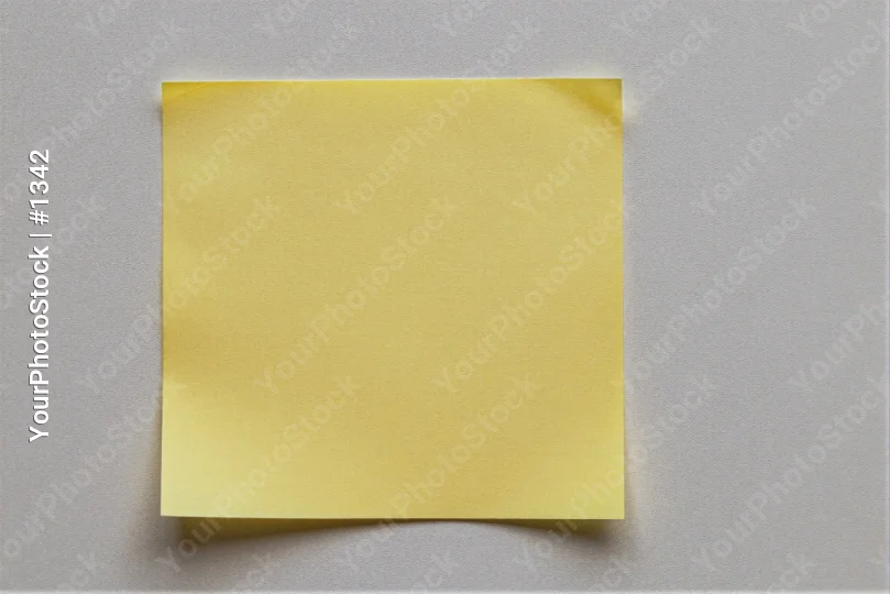 Crumpled Yellow Paper on White Background texture sticky note