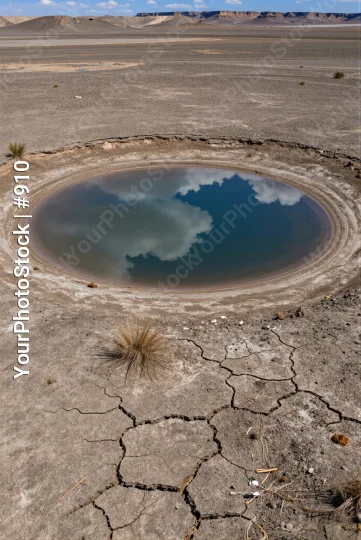 Desert Landscape with Circular Lake dry cracked