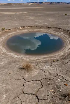 Desert Landscape with Circular Lake dry cracked