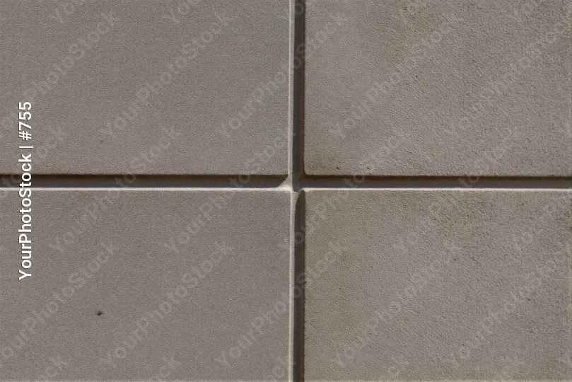 Close-up of Textured Concrete Tiles in Grid Pattern texture