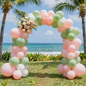 Pastel Balloon Arch with Heart Shape on Grass Lawn