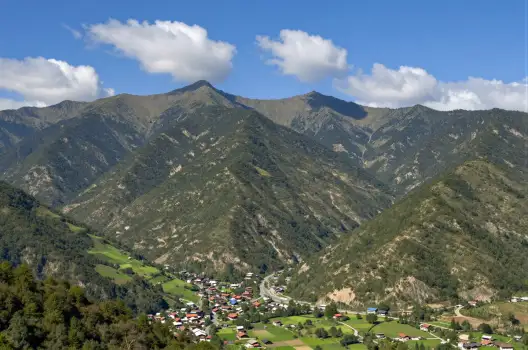Mountainous Landscape with Town mountains green vegetation