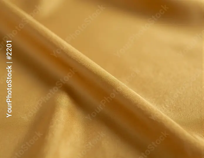Golden Yellow Silk Fabric Close-Up smooth texture