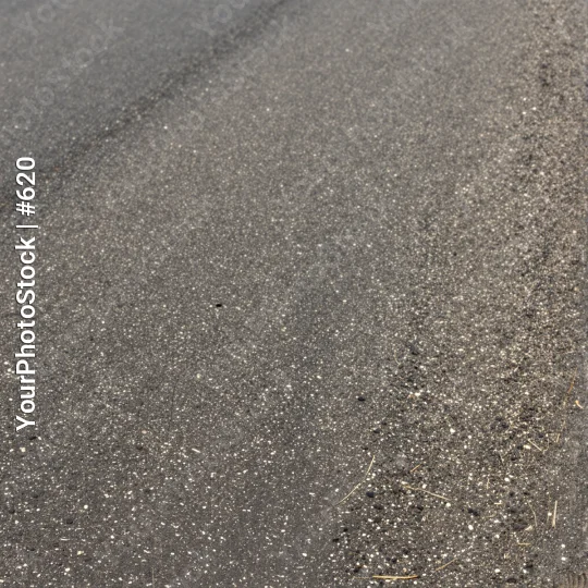 Asphalt Road Surface Close-Up speckled particles