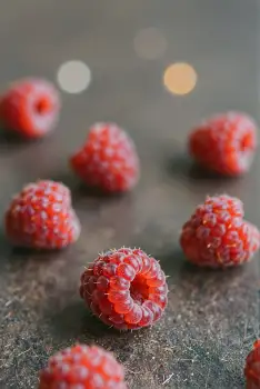 Ripe Raspberries on Dark Grey Surface fresh vibrant