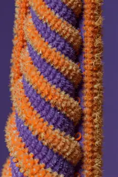 Vibrant Purple and Orange Striped Fabric Close-Up